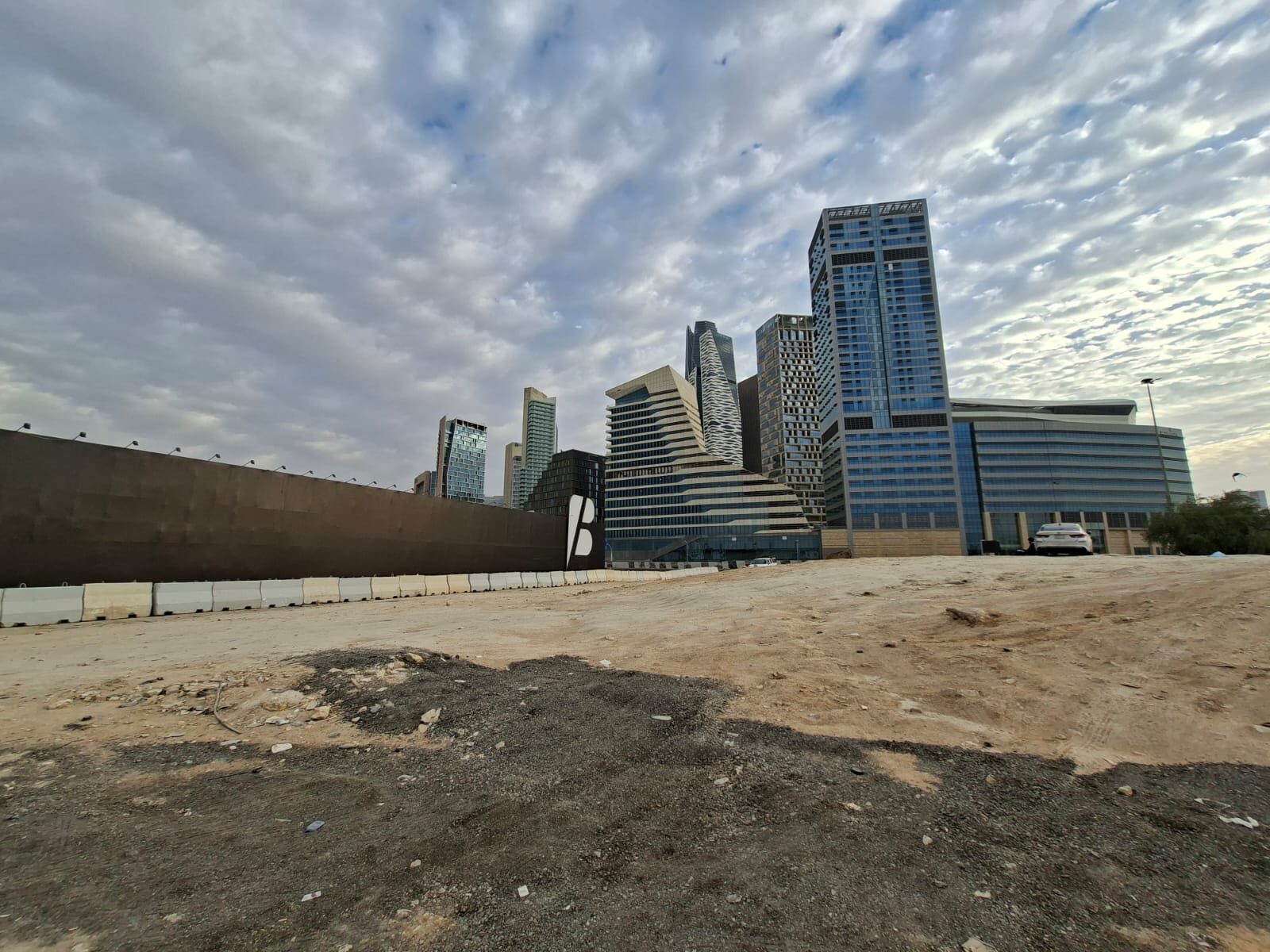Large-Format Boundary Signage — City Backdrop